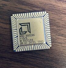 Vintage Collectible Gold Purple Ceramic Intel 1982 AMD R80286 CPU Chip picture