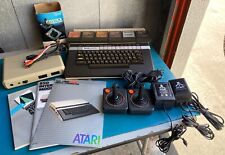 Atari 1200XL Computer w/6 Cartridges Joysticks 850 Interface and Manuals picture