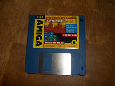 Commodore Amiga disk with 3 games on it. Battlements, Megatron and Dragon Tiles picture
