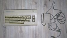 commodore 64 computer  + 2 tapes + power supply picture