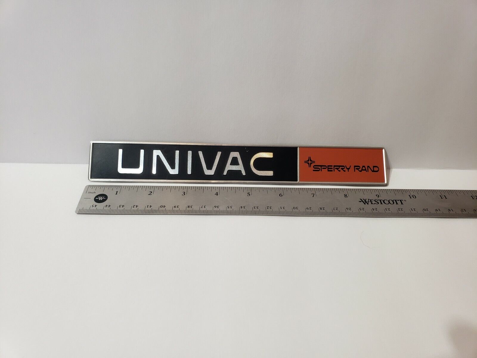 Vintage Univac / Sperry Rand metal mainframe logo 9.5” label.