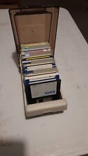 35 random Amiga floppy disks in a box - as is and for parts picture