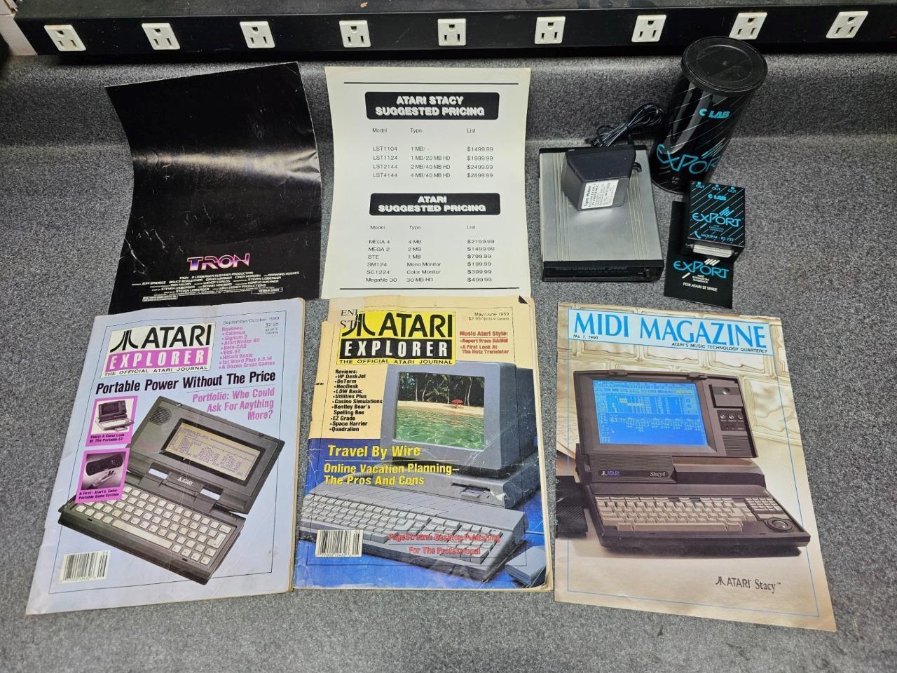 Atari Explorer and MIDI Magazines, Atari Accessories and a Tron Poster