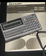 Vintage Sharp Pocket Computer + Manual PC-1246 PC-1247 1984 picture