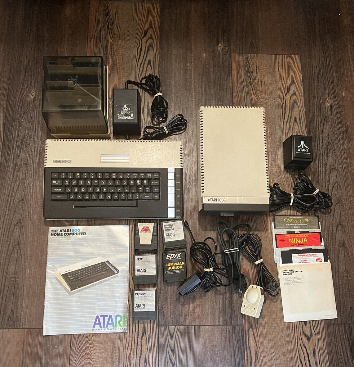 Atari 800XL with Atari 1050 with Manual / Games / and Power Supplies - Untested