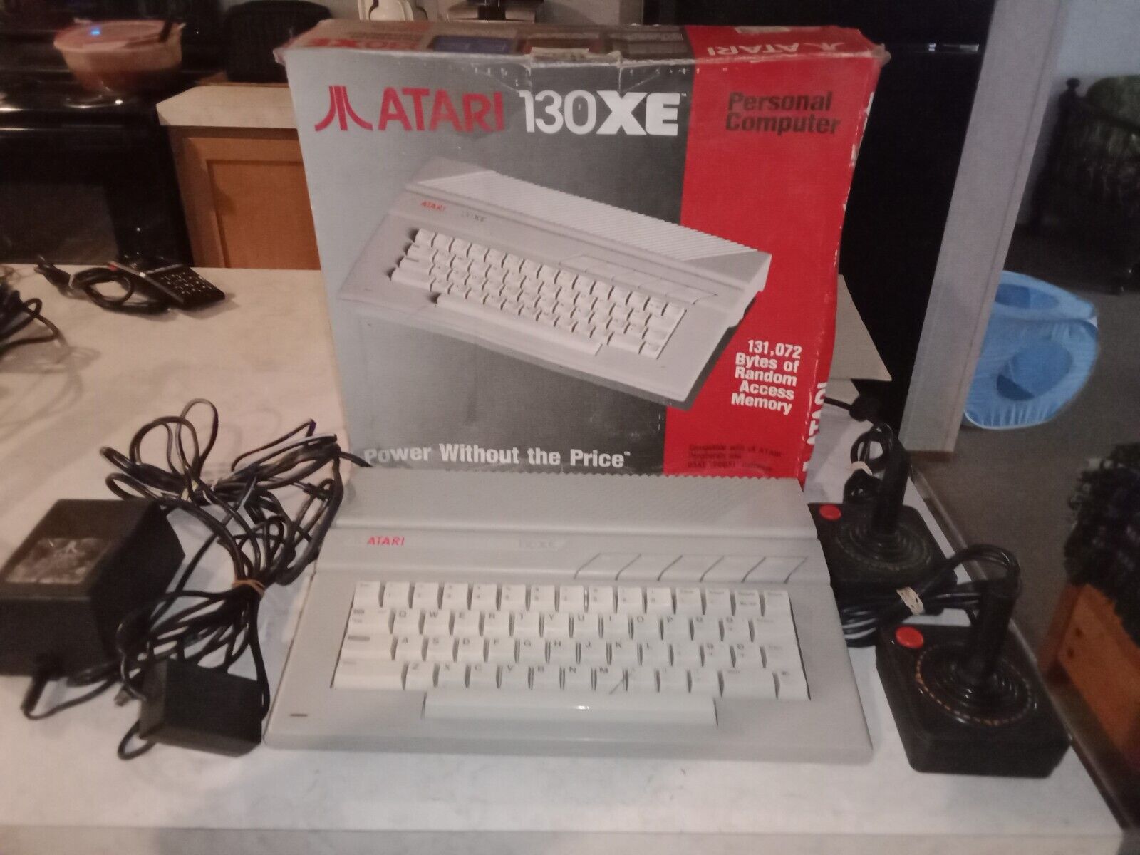 Atari 130xe computer w/power,2600  joysticks, hook up  Original box Works tested