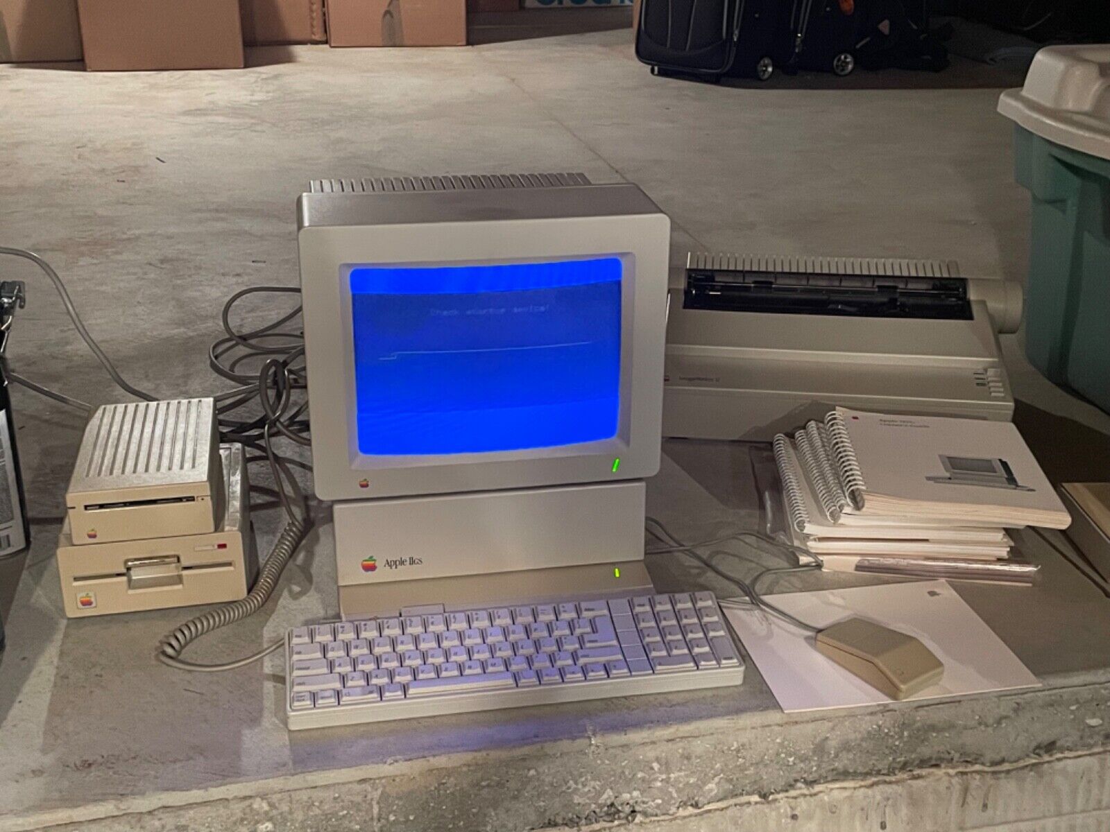 Vintage Apple II GS computer with external discs and printer