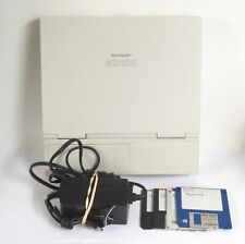 Sharp MZ200 Vintage Laptop Computer W/ Power Cable Powers On Needs Restoration picture