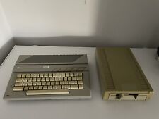 Atari 130xe Computer And Atari Xf551 Disk Drive picture
