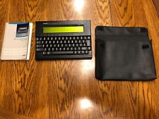 Tandy WP-2 Portable Word Processor, a vintage quasi-laptop, with manual picture