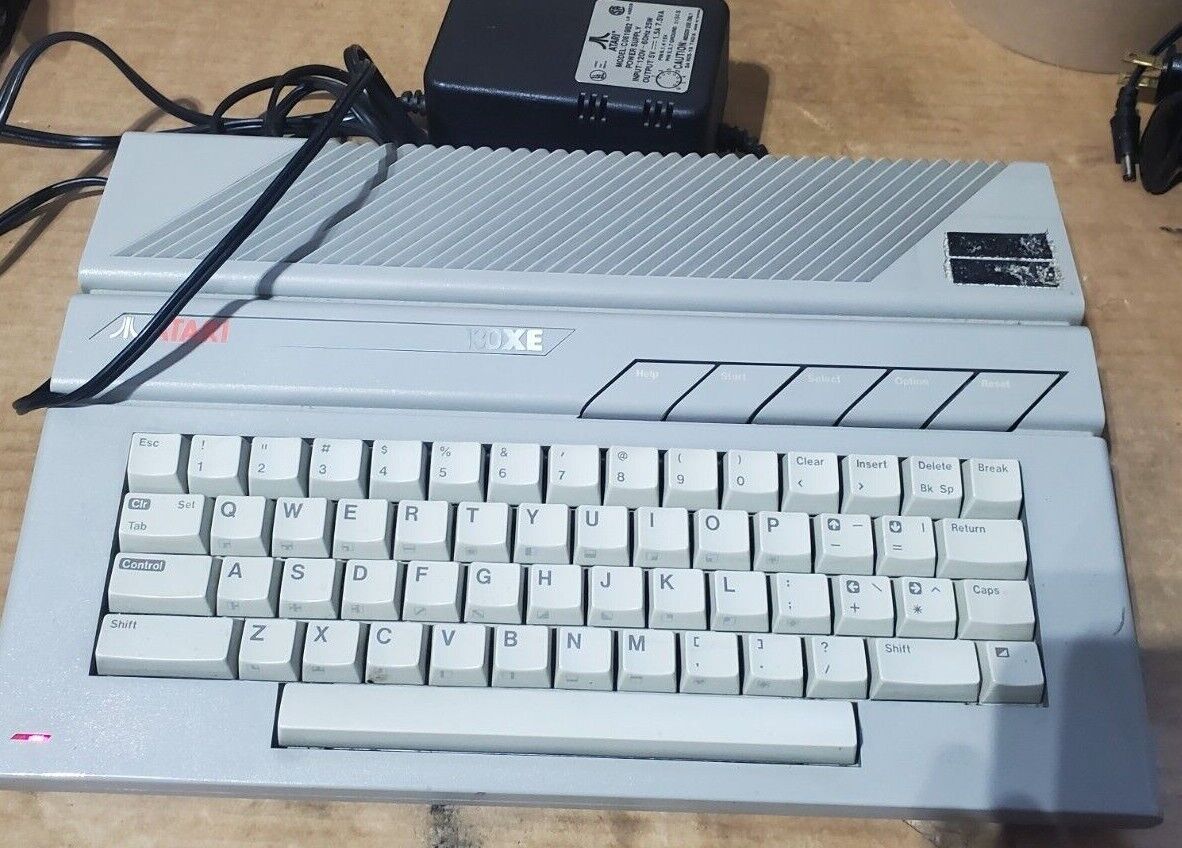 Vintage Atari 130XE Computer with power supply & owner's manual