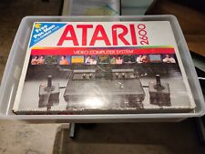 ATARI 2600 Console -BRAND NEW, NEVER OPENED - includes free Pac-Man & Combat picture