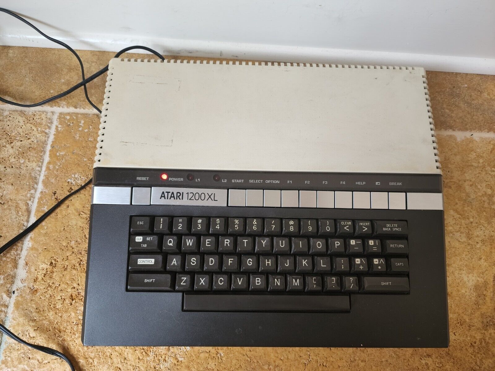 Vintage Atari 1200XL Computer powers on with supply