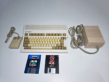 COMMODORE AMIGA A600 PAL RECAPPED + MOUSE + GENUINE PSU - CLEAN picture