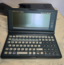 Vintage HP 200LX Palmtop PC 2MB RAM MS-DOS Works w/ Case LCD Screen Lines READ picture
