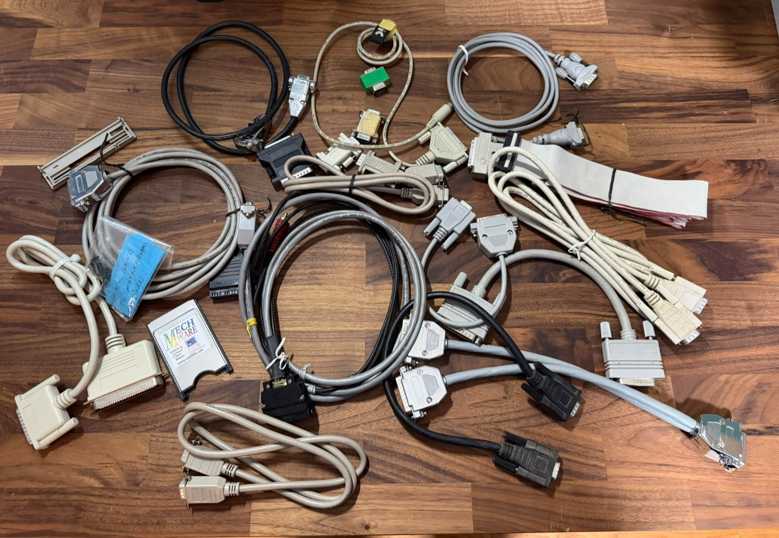 Lot of Miscellaneous Amiga Cables, Adapters, Amiga 3000 Battery, PCMCIA, SCSI Lot of Miscellaneous Amiga Cables, Adapters, Amiga 3000 Battery, PCMCIA, SCSI