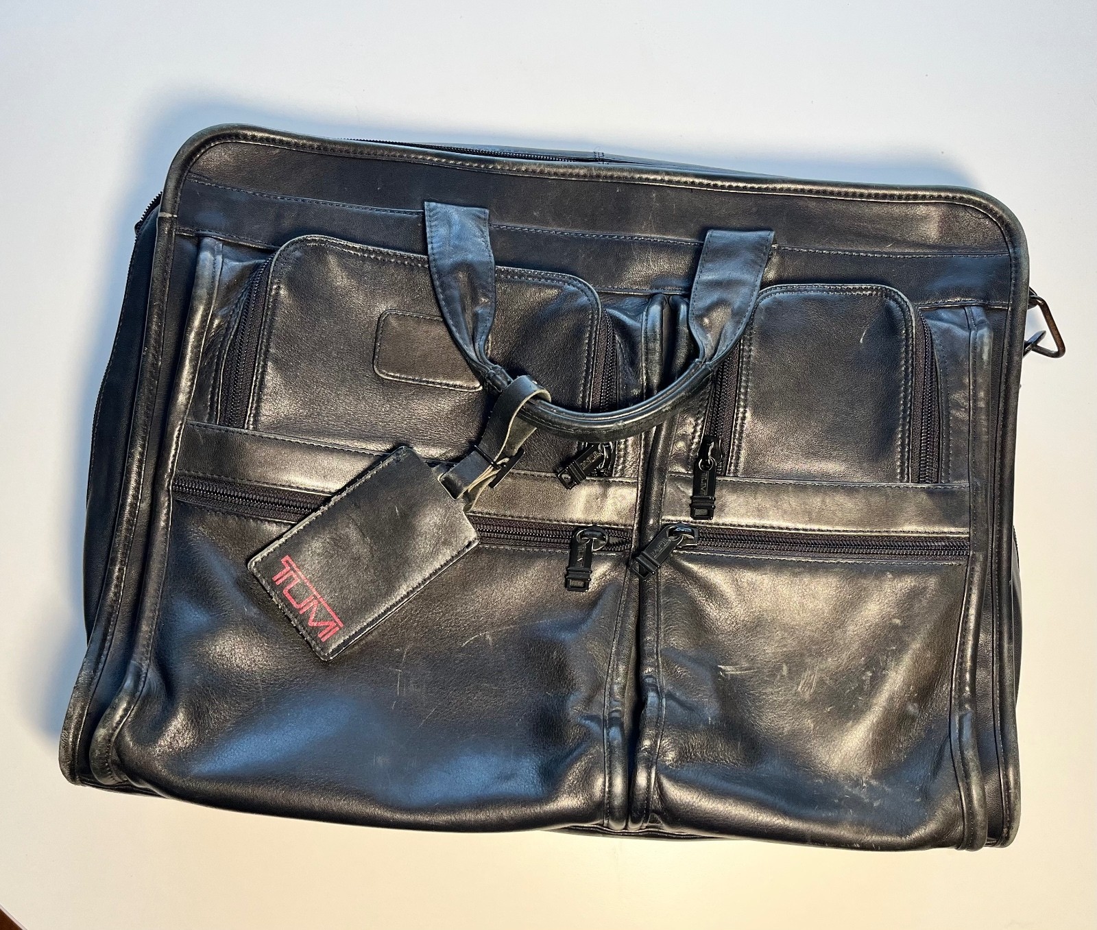 Vintage Distressed Tumi Genuine Leather Black Briefcase with Multiple Pockets