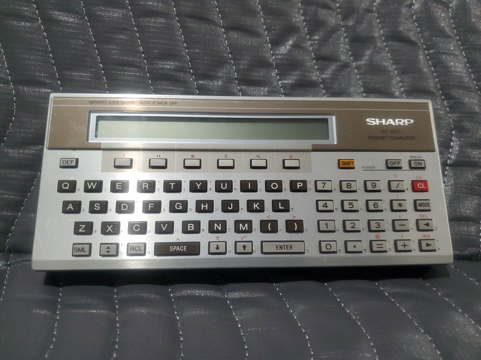 Vintage SHARP PC-1500 Pocket Computer Scientific Calculator POWERS ON, UNTESTED