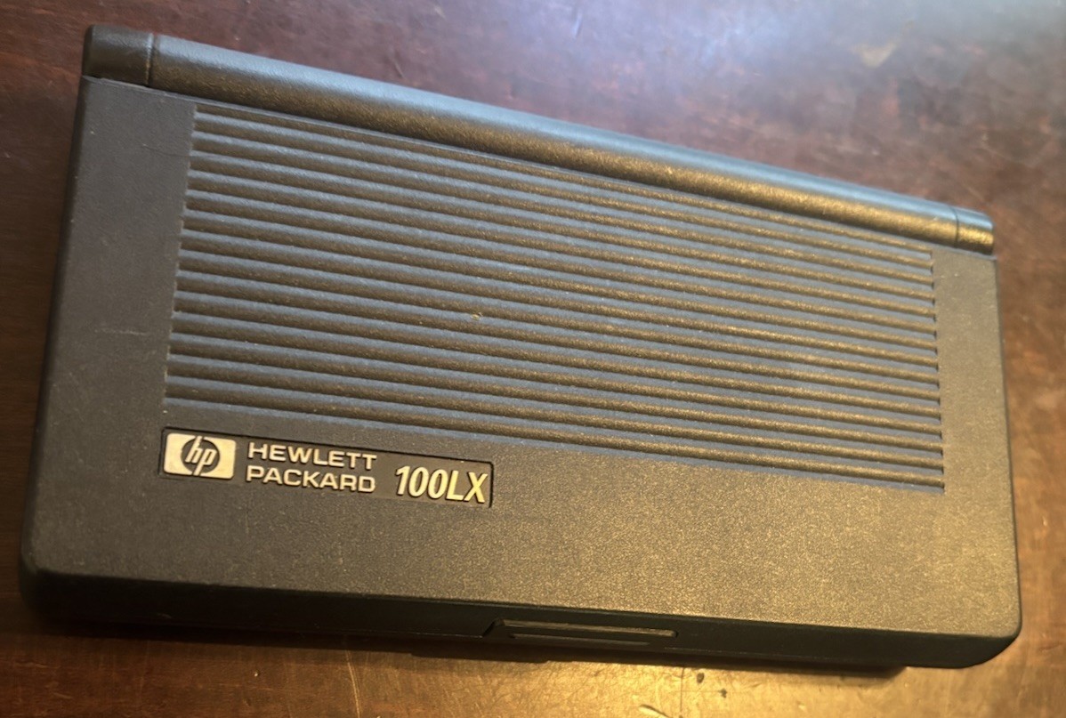 HP 100LX Vintage Pocket Computer Palmtop PC Display Issue, powers, read desc 