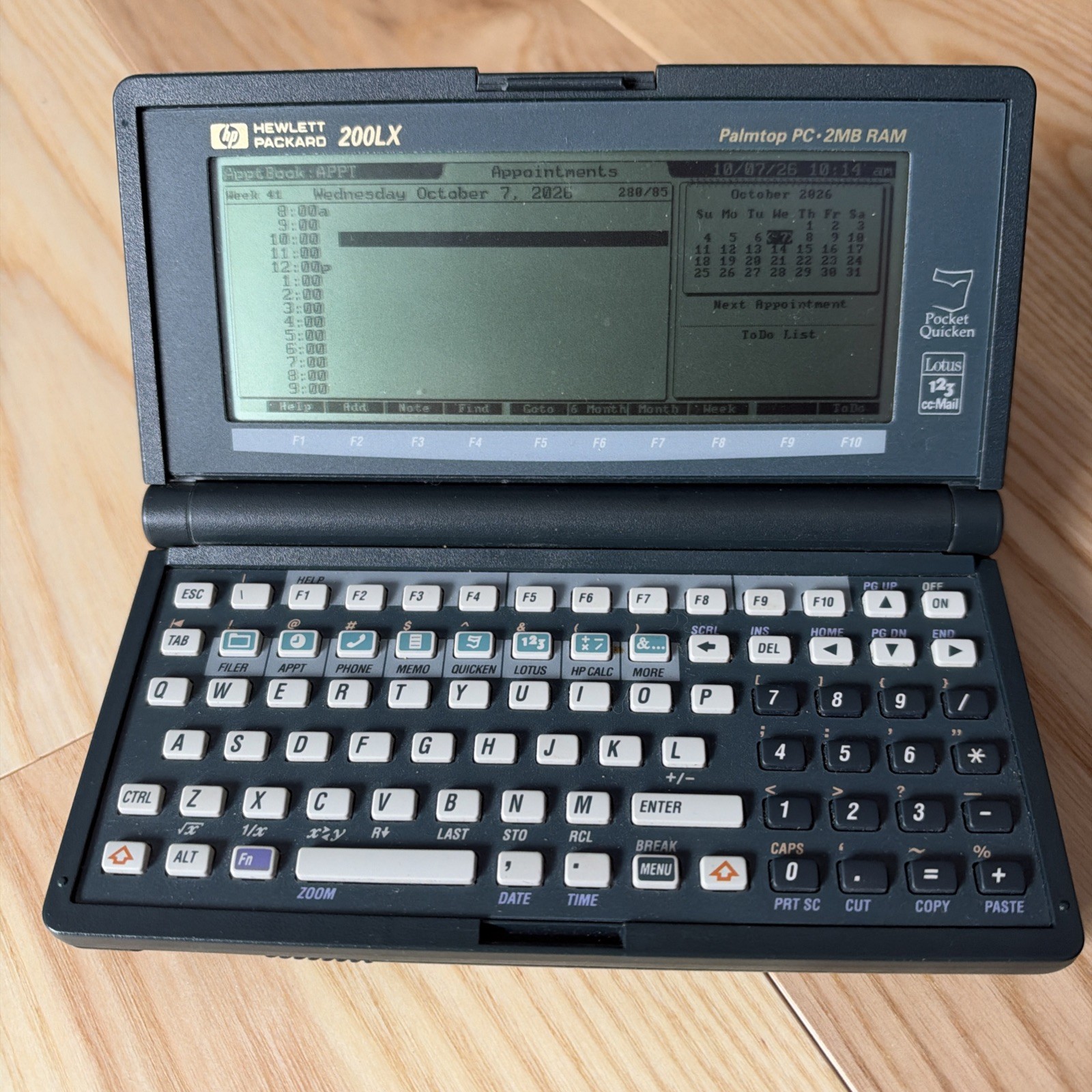 Vintage HP 200LX Classic Handheld 2MB RAM Hewlett Packard Palmtop PC Vintage HP 200LX Classic Handheld 2MB RAM Hewlett Packard Palmtop PC