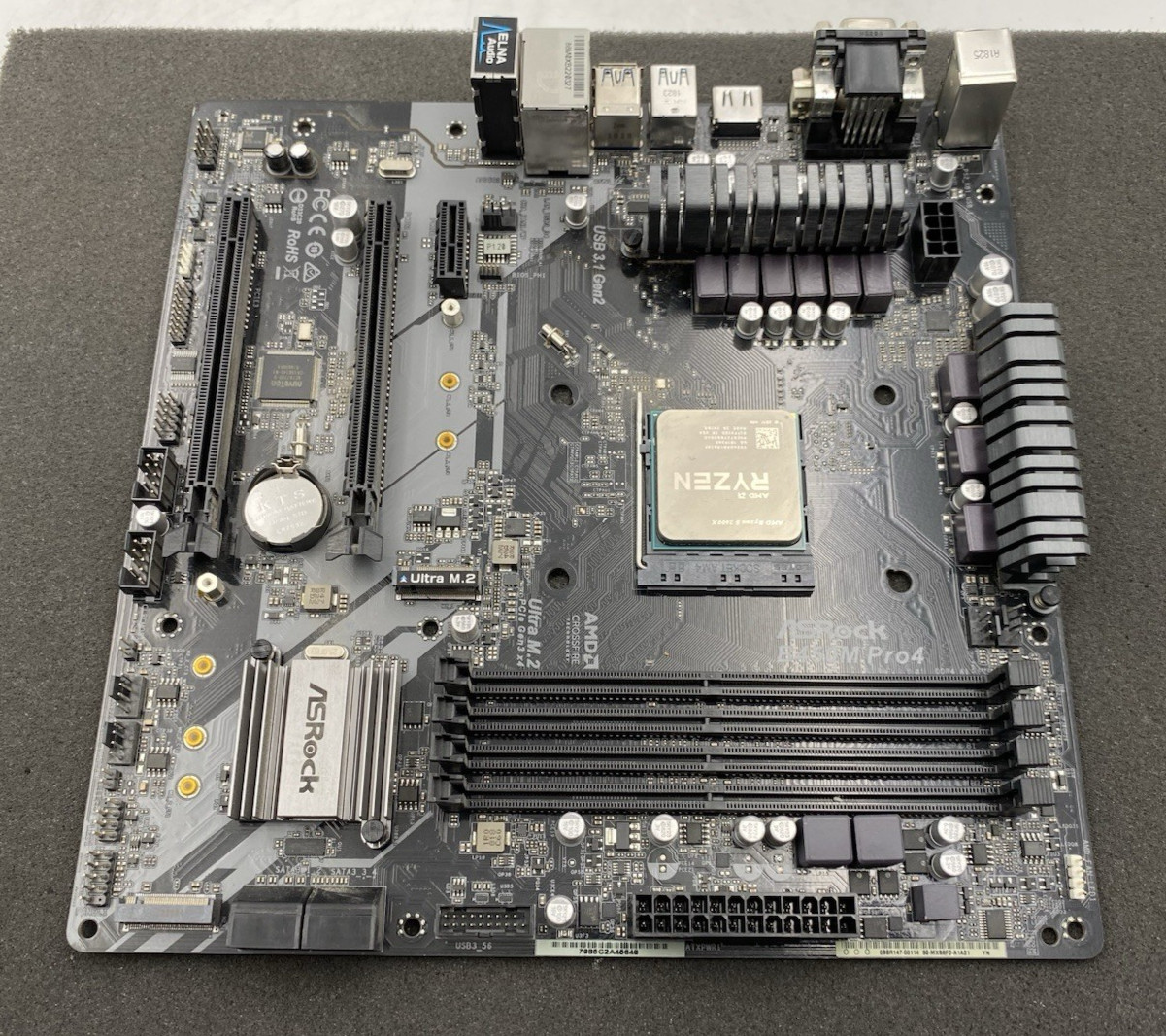 ASRock B450M Pro4 AM4 Motherboard with AMD Ryzen 5 2600X Processor ASRock B450M Pro4 AM4 Motherboard with AMD Ryzen 5 2600X Processor