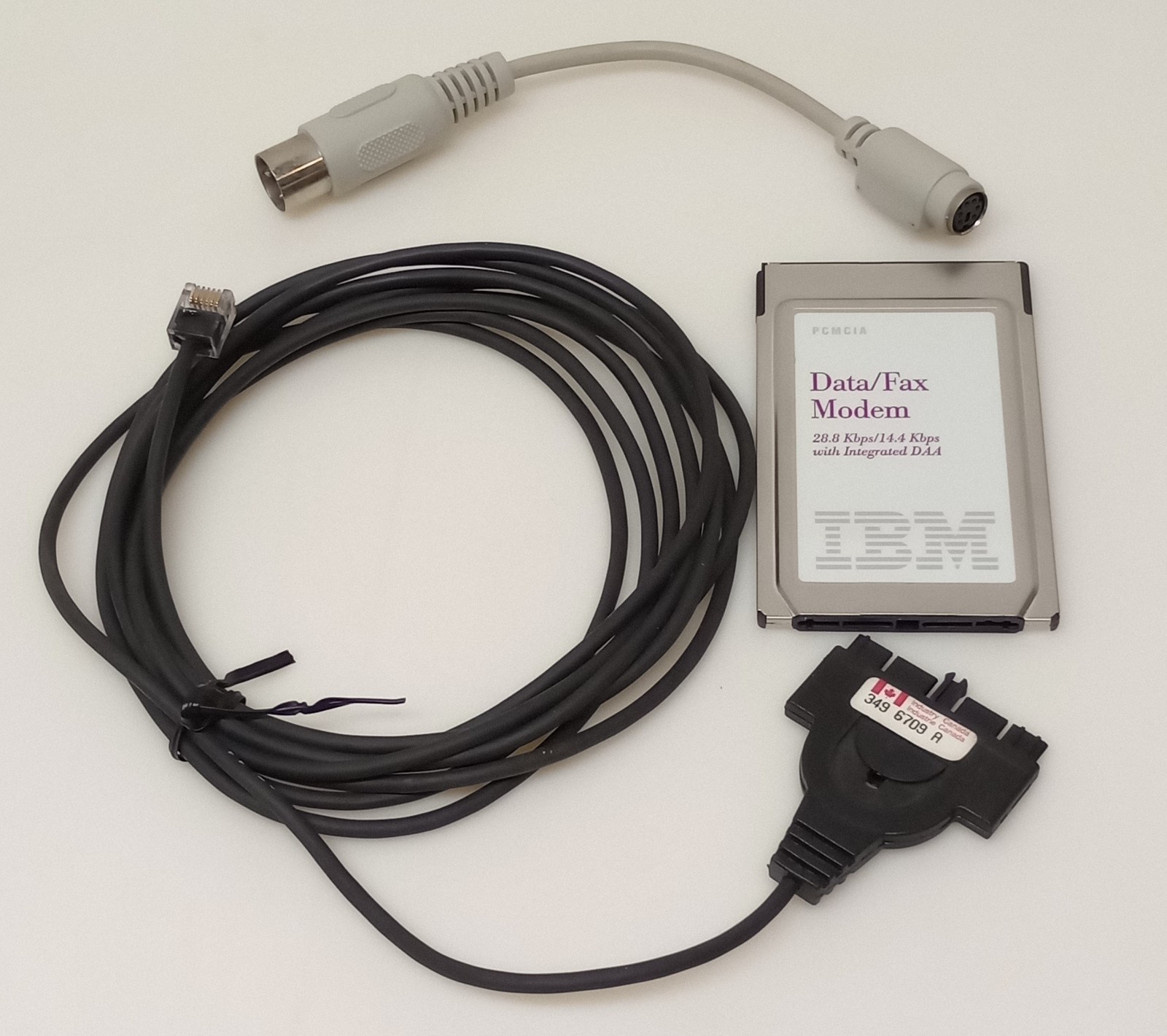 Vintage IBM PCMCIA 28.8K Data/Fax Modem Card Lot w/ Dongle & PS/2 Adapter Retro Vintage IBM PCMCIA 28.8K Data/Fax Modem Card Lot w/ Dongle & PS/2 Adapter Retro