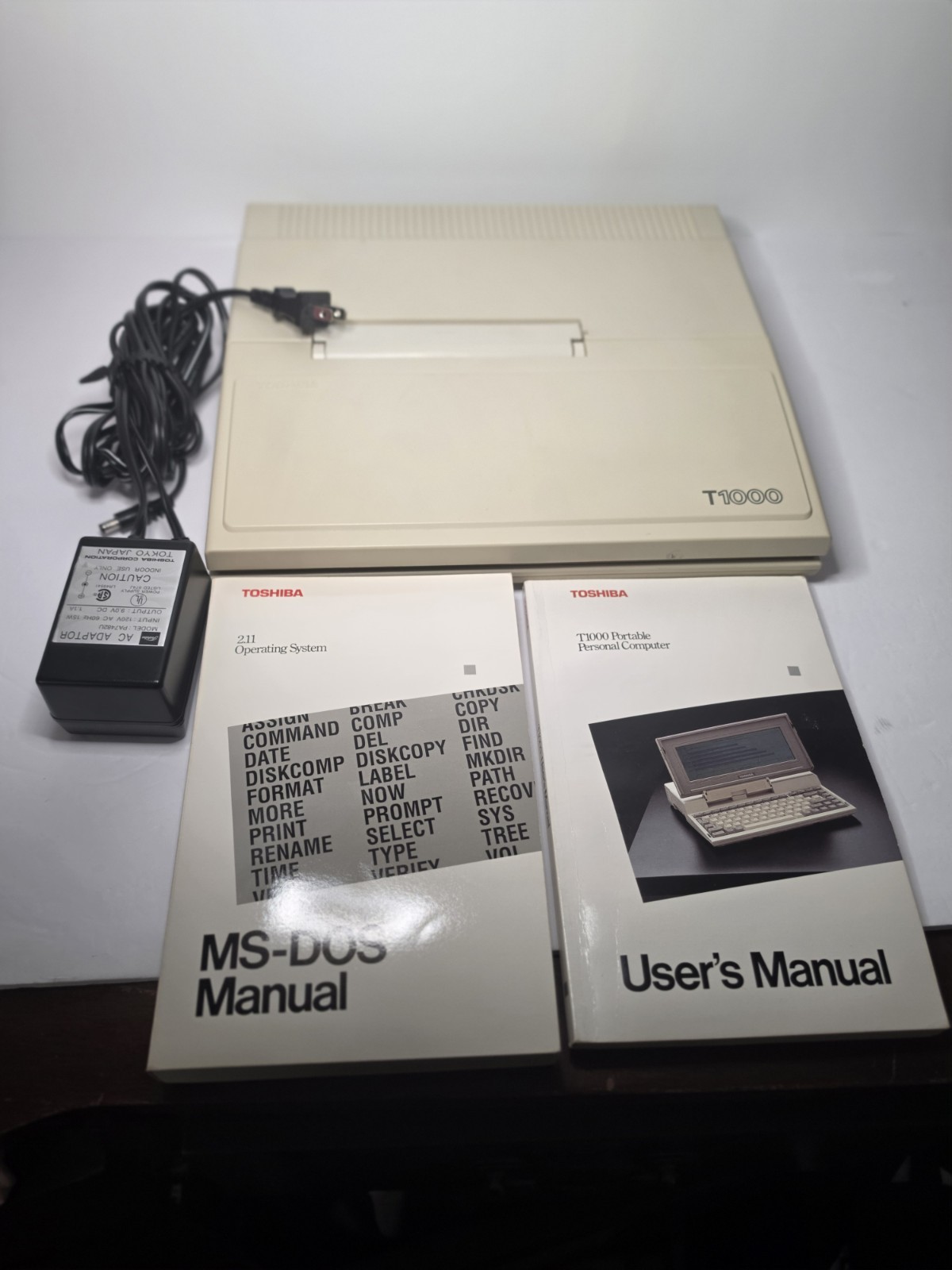 Toshiba T1000 Vintage Laptop PC, 1 power supplies, manuals, and original bag