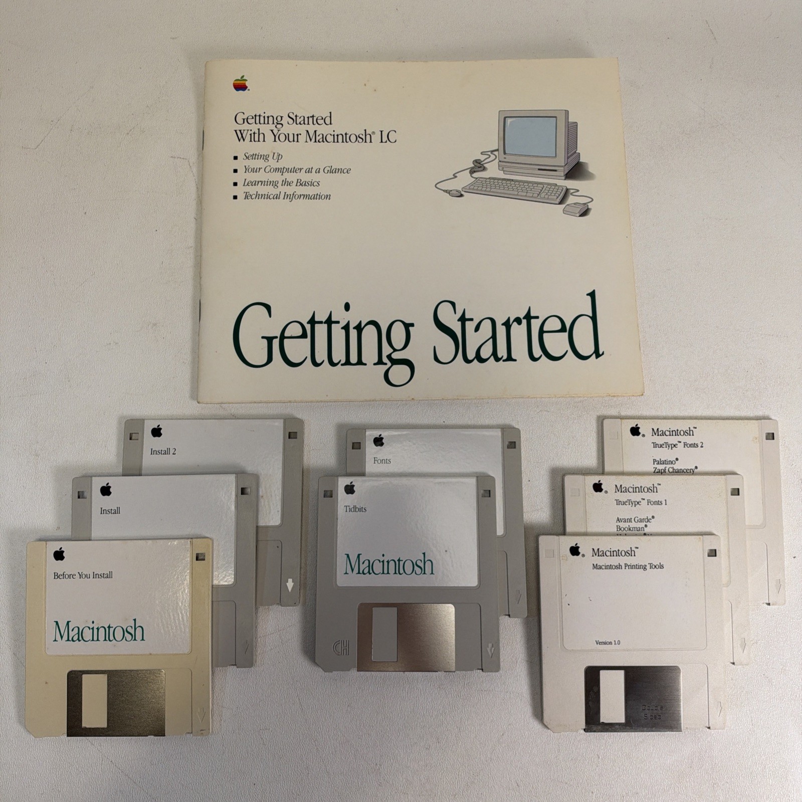 Vintage Apple Macintosh LC Getting Started Manual With Lot of 8 Floppy Discs Vintage Apple Macintosh LC Getting Started Manual With Lot of 8 Floppy Discs